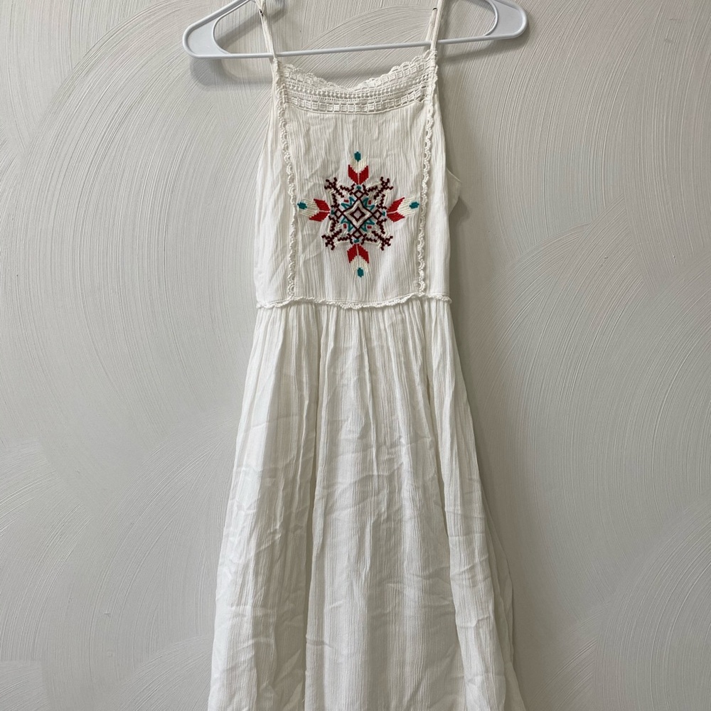 Tea length dress with beautiful detailing.